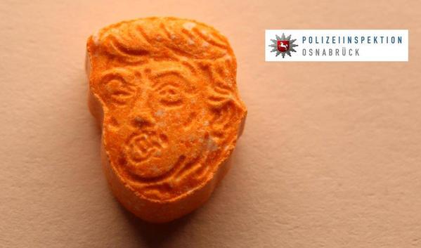 Ecstasy laranja com a cara do Trump