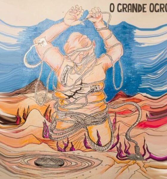 O Grande Ogro mistura metal, prog e pós-hardcore em duas faixas instrumentais longas e caóticas, com riffs pesados e clima de protesto.